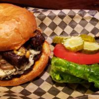 Bacon Blue Burger · house patty, bleu cheeze, mushroom + onions, thrilling foods bakon, burger sauce. lettuce, t...