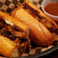 French Dip · Seitan, grilled mushroom and onions, garlic mayo on hoagie roll. Served with side of Au Jus