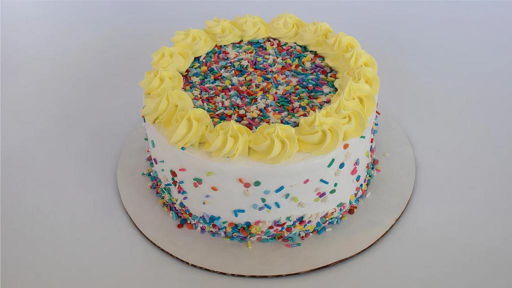 Confetti Froyo Cake · Cue the Confetti! Not only is this cake covered in delicious sprinkles, but the inside is a party too! Slice into layers of White Cake, Cake Batter and Vanilla Froyo, with crunchy sprinkles. This cake comes as a 7” round cake and serves 10-12 people.