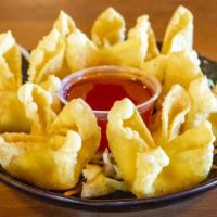 Crab Puff (6 Pcs.) · Honey meets west Cream cheese blended with imitation crab meat in a crispy wonton.