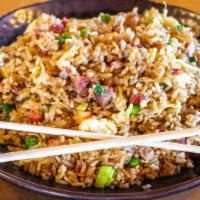 Fried Rice · Includes eggs, peas, carrots, and green onions