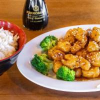 Sesame Chicken (White Meat) · Deep fried chicken,cooked in a flavored sesame sauce. Served with broccoli.