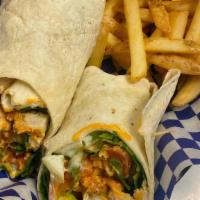 Buffalo Chicken Wrap · Grilled chicken breast tossed in our signature buffalo sauce, blue cheese dressing, tomatoes...