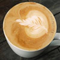 Cafe Latte · A traditional favorite! Our locally roasted and freshly ground espresso beans and steamed mi...