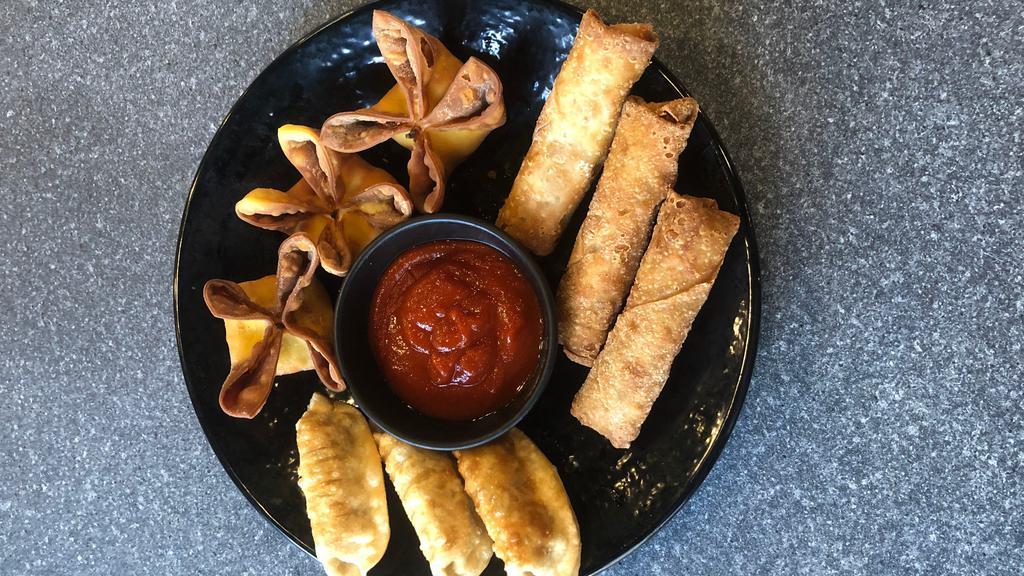 A Taste Of The Bounty · Three piece of each egg rolls, potstickers, crab rangoons, served with sweet and sour dipping sauce.
