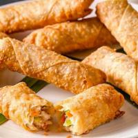 Crispy Egg Roll · Filled with pork and vegetables, lightly fried, served with sweet and sour sauce.