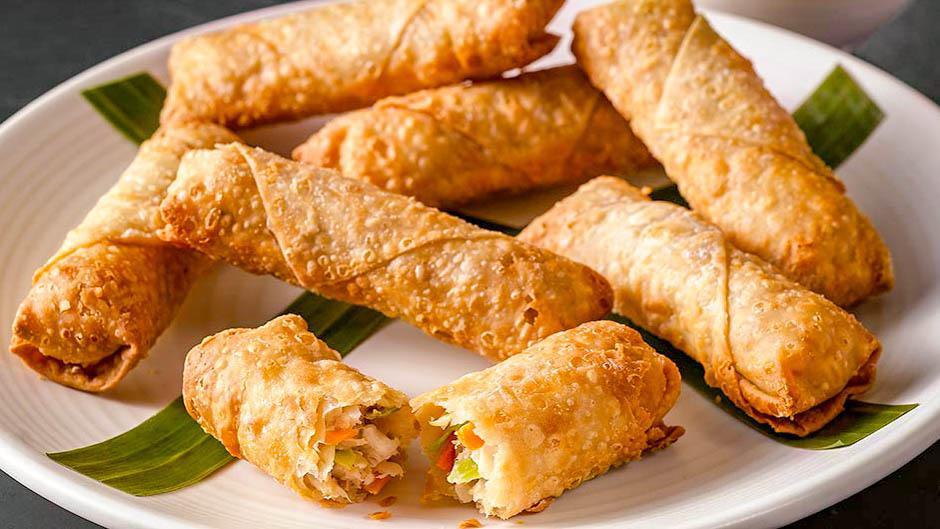 Crispy Egg Roll · Filled with pork and vegetables, lightly fried, served with sweet and sour sauce.