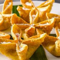 Krab Rangoons · Filled with krab, scallions and cream cheese. Served with sweet and sour sauce.