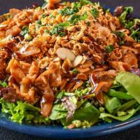 Chicken Teriyaki Salad · Mixed greens topped with teriyaki chicken, toasted noodles, almonds, tomatoes, mandarin oran...