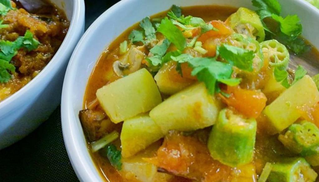 All-Star Okra Curry (Vegan Option).. · Authentic locals' favorite. Okra, Chayote Squash, Sliced Button Mushrooms, Eggplant, and Tomatoes all united to form The Top Burmese's All-Star curry, commonly called 