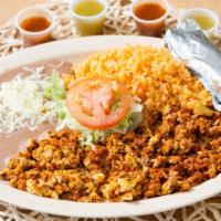 Huevo Con Chorizo · Chorizo and eggs. Served with a side of Rice, Beans, and tortillas