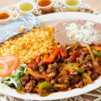 Steak Ranchero · Chopped beef steak meat sautéed with bell pepper, tomatoes and onions and a spicy yet sweet ...