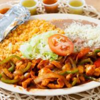 Pollo Ranchero · Chicken bell pepper, tomatoes and onions sautéed with a spicy yet sweet sauce served with a ...