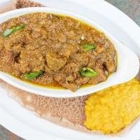 Yebeg Alicha · Curried lamb stew cooked with onion, turmeric with garlic and ginger.