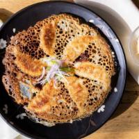 Pork Gyoza · Pan fried w/ dipping sauce