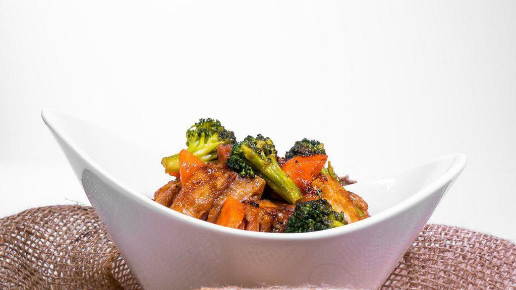 Chicken Teriyaki Bowl · Pan fried chicken with broccoli and carrots all cooked in homemade teriyaki sauce served with a bed of rice.