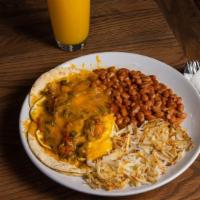 Huevos Rancheros · 2 fried eggs on top of corn tortillas smothered with cheese and your choice of chile. Comes ...