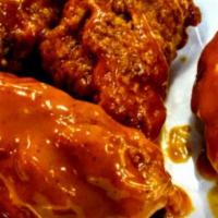 Boneless Chicken Wings (8 Pc) · Tender pieces of chicken breast fried or grilled, tossed in one of our homemade sauces; BBQ,...