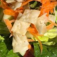 House Side Salad · Romaine lettuce, diced cucumber, shredded carrot, cherry tomatoes and samosa crisps served w...