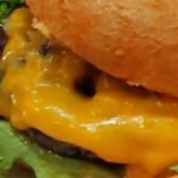 Classic Cheeseburger · This classic burger comes with cheddar cheese, lettuce, tomato, red onion, pickles and our s...
