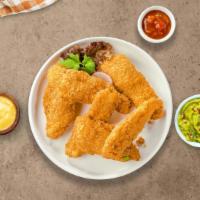 Classic Crunchy Tenders · Chicken tenders breaded and fried until golden brown.