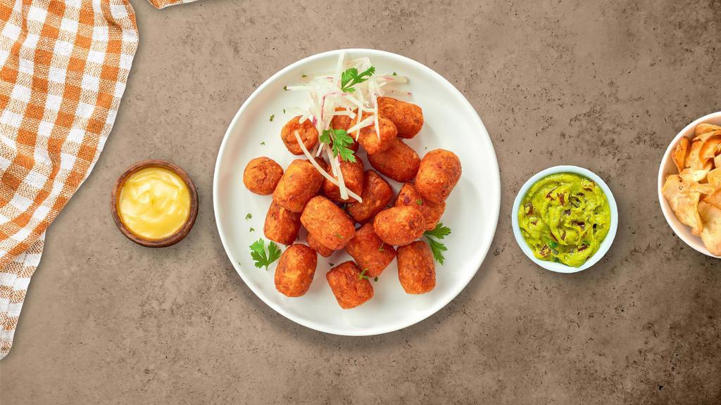 Sweet Tots Of You · (Vegetarian) Shredded sweet potatoes formed into tots, battered, and fried until golden brown.
