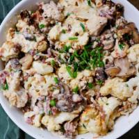 Cauliflower Carbonara · Keto. Roasted cauliflower slices in cream sauce with smoky bacon, chicken, mushrooms, Parmes...