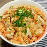Cauliflower Rice Stir Fry · Gluten-free. Low carb item. Ginger-garlic cauliflower rice, diced chicken breast, chopped ca...