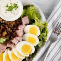 Protein Cobb Salad · Keto. Gluten-free. Butter lettuce, fanned avocado, hard-boiled egg, crispy bacon, diced ham,...