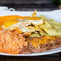 Green Chilaquiles · Triangle corn tortilla smothered in Chile, Two eggs (with a side of rice and beans)