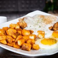 Country Steak · Fried Steak, two eggs smothered in Country gravy with a choice of Hashbrown or Country-Style...