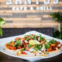 Tacos (4) · Meat Choice: Steak, Carnitas, Al Pastor or Chicken

Topped with Cilantro and Onion.