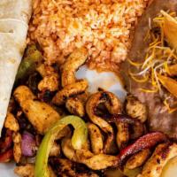 Chicken Fajitas · Bell peppers, red onions with a side of beans and rice
(Choice of Flour or Corn Tortilla)