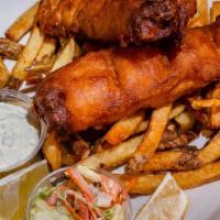 Fish & Chips · Pacific cod, beer battered and fried golden brown served with coleslaw and house tartar sauce.