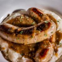 Bangers & Mash · 2 Irish style sausages served over mash potatoes with our savory house gravy.