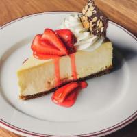 New Jersey Style Cheesecake · Graham cracker crust strawberry compote, and chocolate almonds.