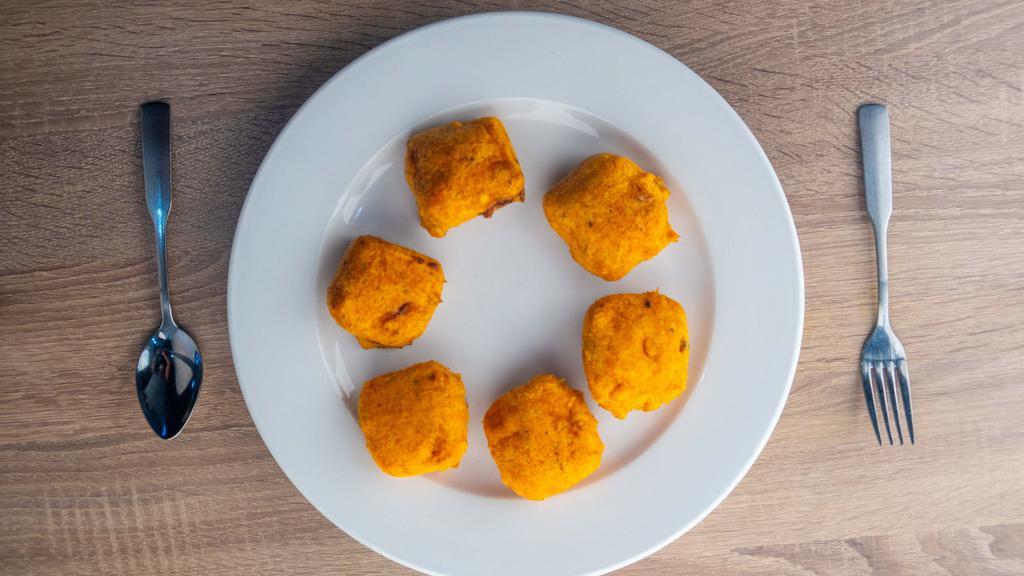 Paneer Pakora (6 Pcs.) · Delicately seasoned, melt in your mouth fresh cottage cheese balls crumbed and fried.