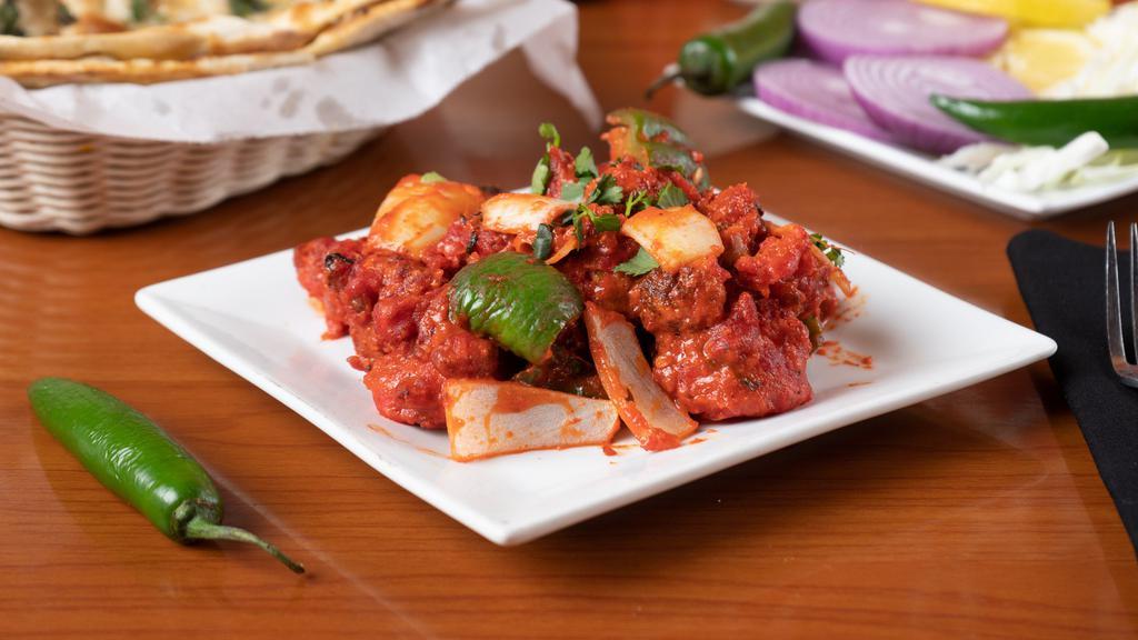 Chilli Paneer · Paneer (Indian cottage cheese) sautéed with onions, bellpeppers, spices, chillies, and herbs.