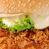 Crispy Zinger Burger · Enjoy the crispy chicken fillet in a soft bun with spicy mayo and our signature sauce with f...