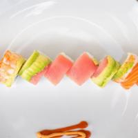 Rainbow Roll · Eight pc. - crab salad, cucumber, topped with tuna, salmon, and avocado.


Consuming raw or ...
