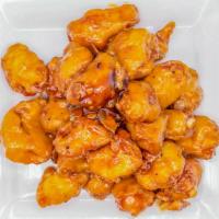 Orange Chicken · * has a kick to it, please ask to adjust for your taste.