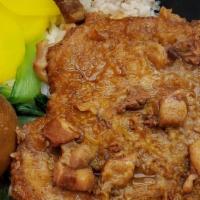 Braised Pork Chop / 滷排骨飯 · Fried pork chop dipped into marinade sauce includes white rice egg vegetable