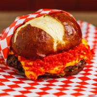 Flaming Devil Burger · Brioche bun, cheese sauce, flaming cheetos