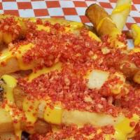 Flaming Devil Fries · straight cut fries, covered in cheese sauce and flaming hot cheetos.