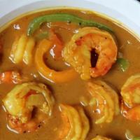 Curry Shrimp · Large black tiger shrimp, sauteed in zesty Jamaican curry sauce.