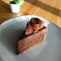 Chocolate Cake Slice · Chocolate chiffon cake with chocolate ganache filling and chocolate mousse frosting.
