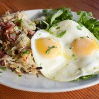 Morning Hash · Two eggs, hash browns, pancetta, red onion, and grana, roasted in a cast-iron skillet and ne...