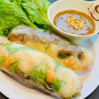 Spring Rolls (2) · Steamed shrimp, grilled pork, rice noodles, and lettuce wrapped in rice paper. Served with p...