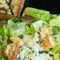 Caesar Salad · Crisp Romaine | Garlic Croutons Parmesan | Caesar Dressing