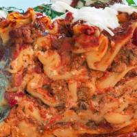 Lasagna · Sheets of Pasta| Sausage Crumbles | Cashew Ricotta Spinach | Marinara | Basil | Parmesan